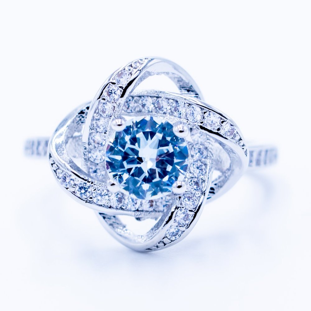 Clear Zircon in Silver Ring
